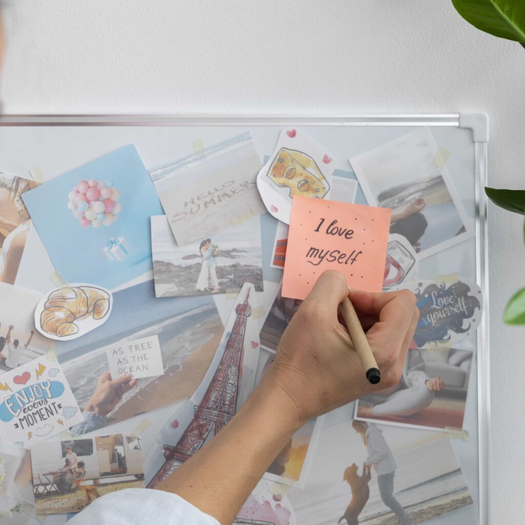 side view woman writing post it